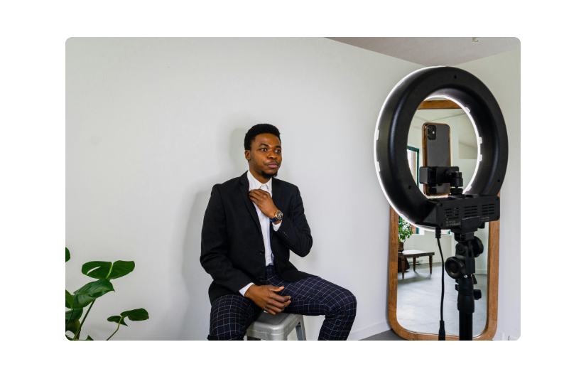 Professional creator recording a video with a ring light, showcasing influencer affiliate marketing tips for creators. 